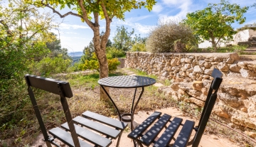 Resa Estates Ibiza finca for sale te koop st Jordi chairs exterior.jpg